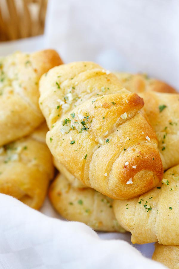 Easy Garlic Butter Cheesy Crescent Rolls made with Mozzarella cheese and topped with garlic herb butter.