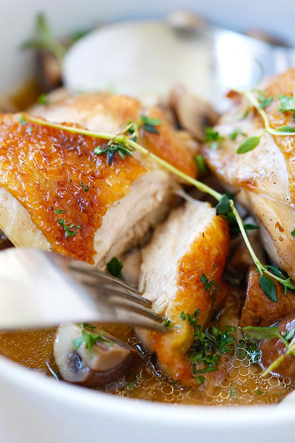 Close up Sliced chicken breast with Sauteed Mushroom.