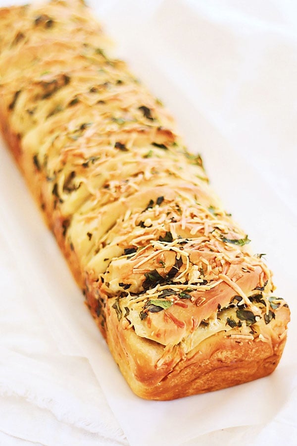 Easy and quick homemade loaf of garlic herb butter and cheese pull apart bread.