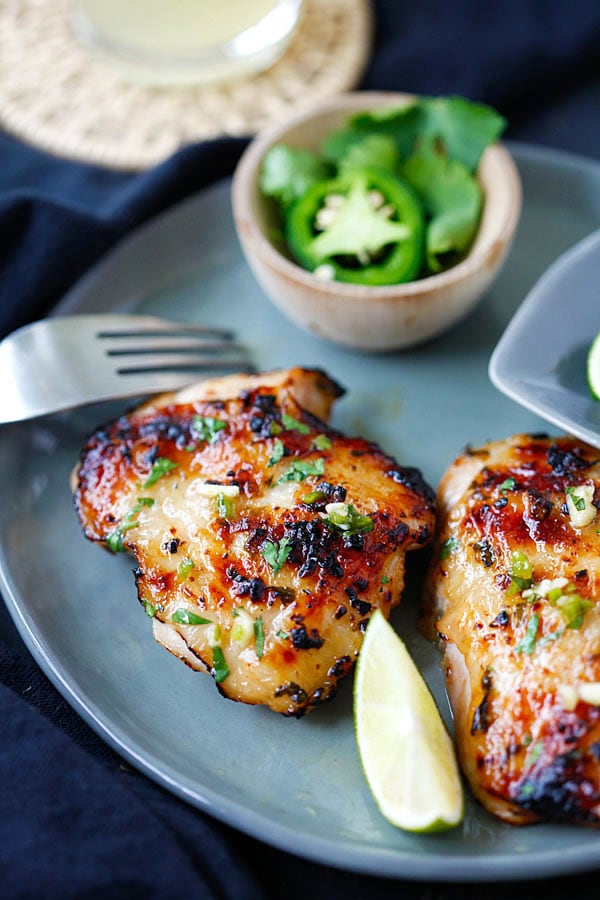 Easy and quick Chipotle Lime Chicken with chipotle chili, lime juice, garlic and cilantro in serving dish.