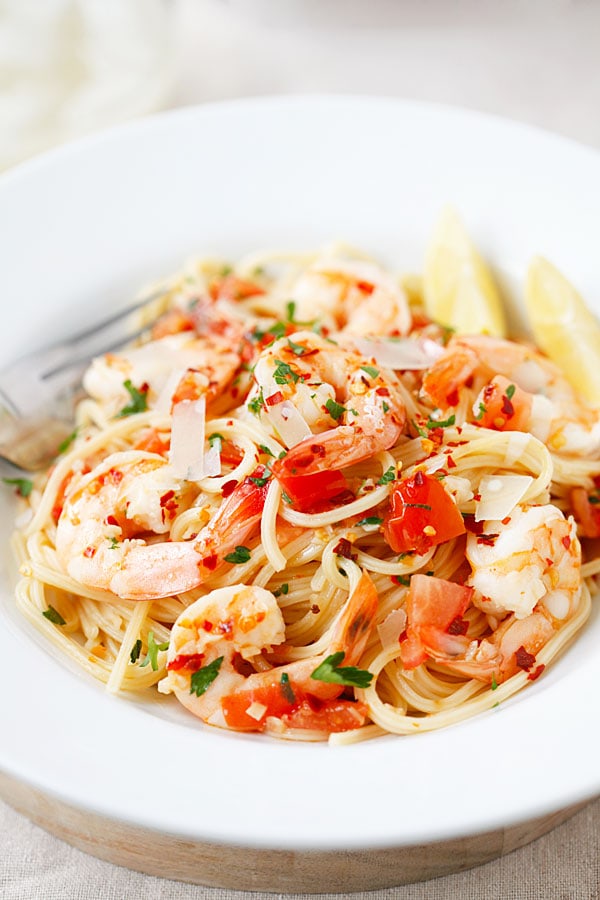 Spicy Shrimp Pasta with chili flakes, butter garlic herb sauce in a plate.