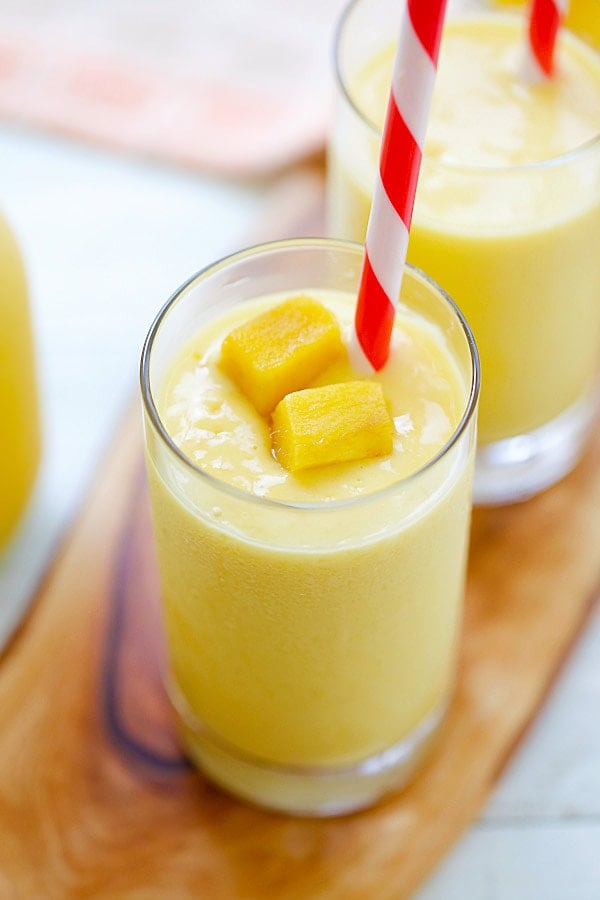 Mango Lassi - a rich, popular Indian smoothie with fresh mango, yogurt and honey. Easy recipe that takes 10 mins to make! | rasamalaysia.com