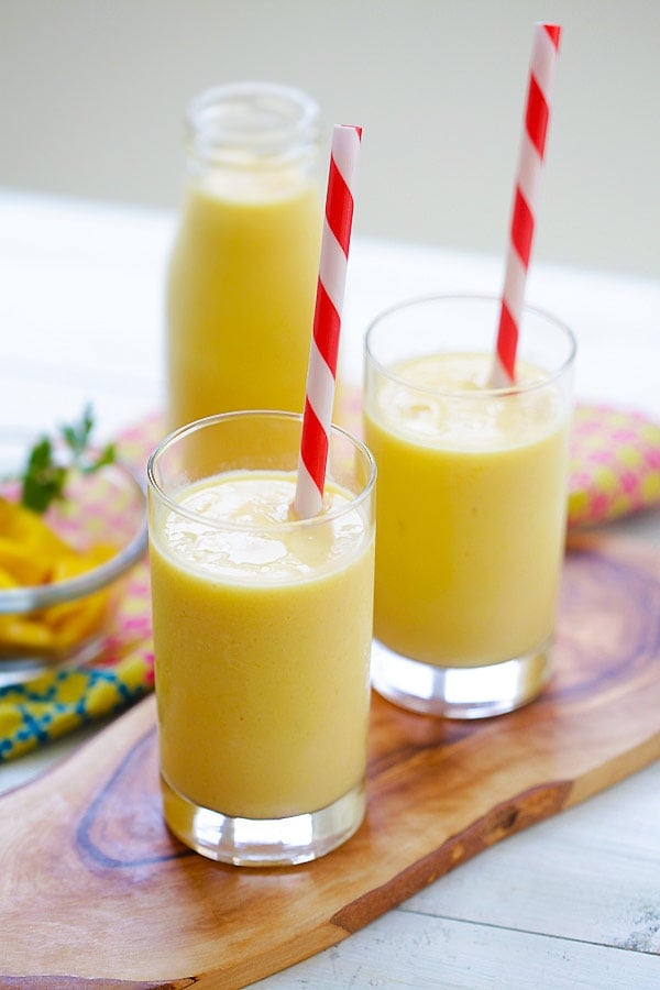 Mango Lassi - a rich, popular Indian smoothie with fresh mango, yogurt and honey. Easy recipe that takes 10 mins to make! | rasamalaysia.com