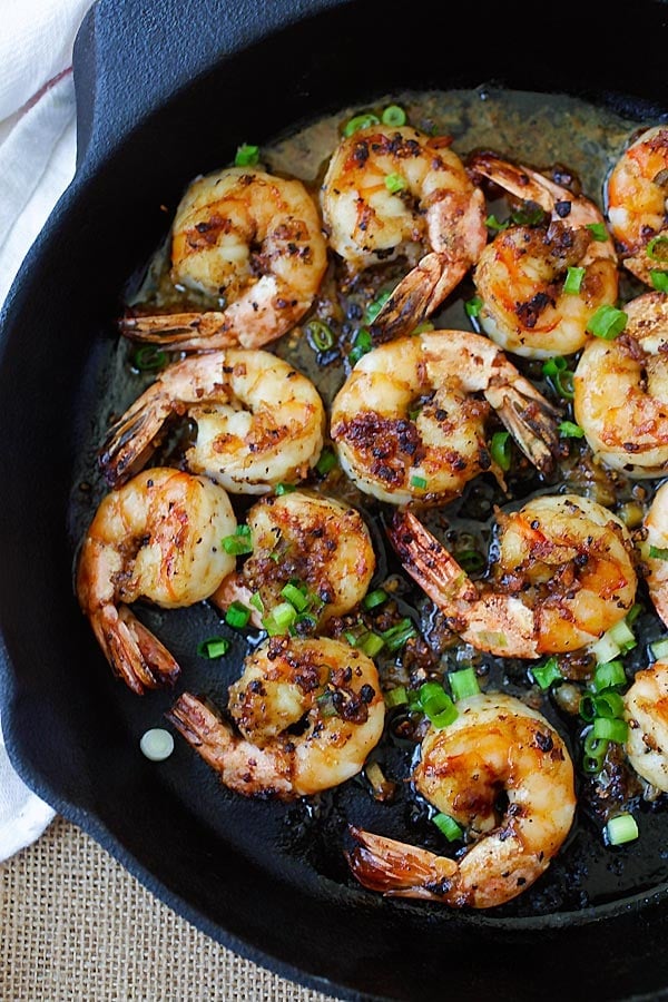 Black pepper shrimp with garlic, butter and black pepper sauce in a skillet, ready to be eaten.