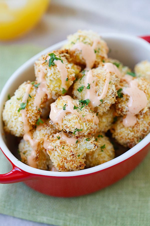 Crispy and healthy parmesan baked cauliflower in a serving dish.
