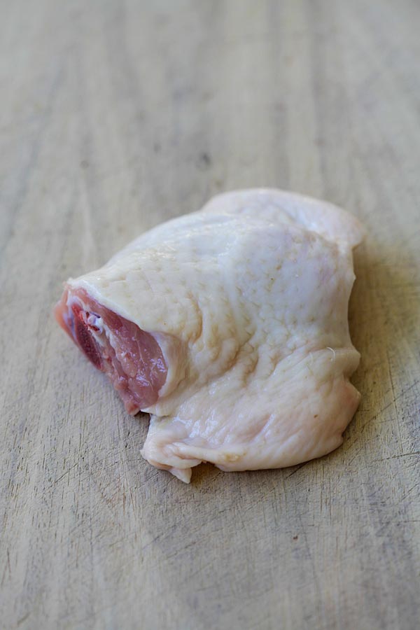 Learn the easy step-by-step to debone chicken thighs so you keep the skin on, but with no bones | rasamalaysia.com