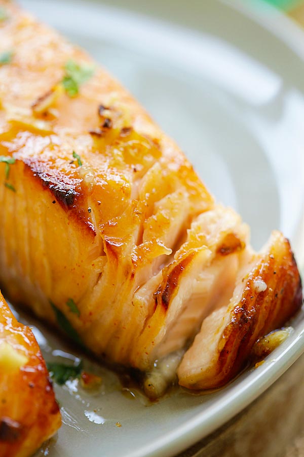 Baked salmon fillet on a plate.