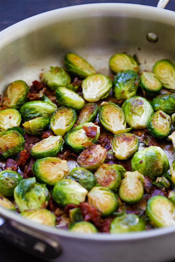 Homemade easy and quick roasted Garlic-Prosciutto Brussels Sprouts in skillet.