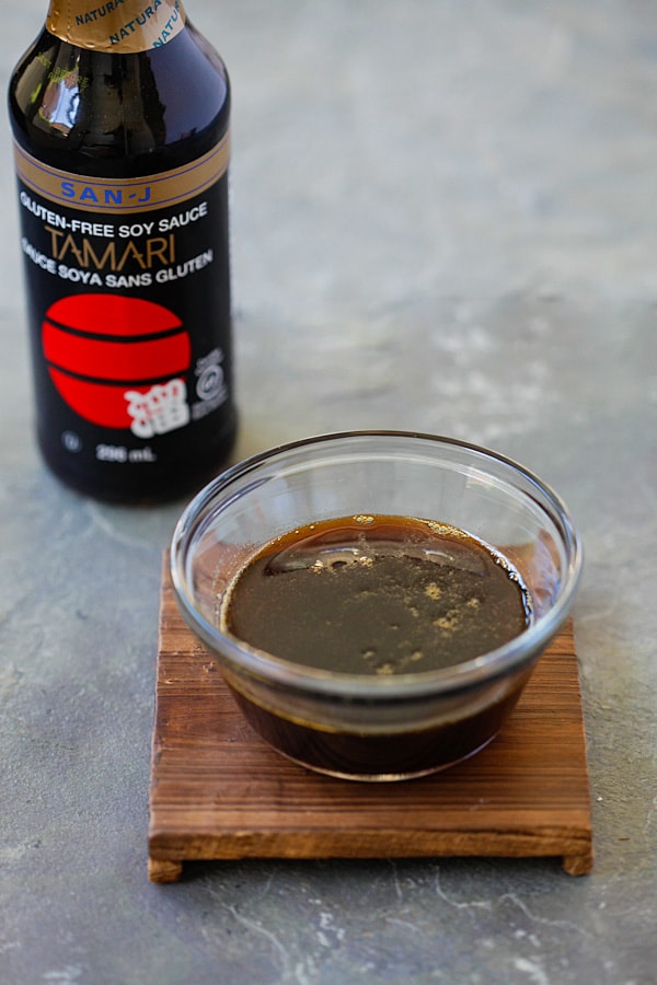 Gluten-free San-J Tamari soy sauce in a small bowl.