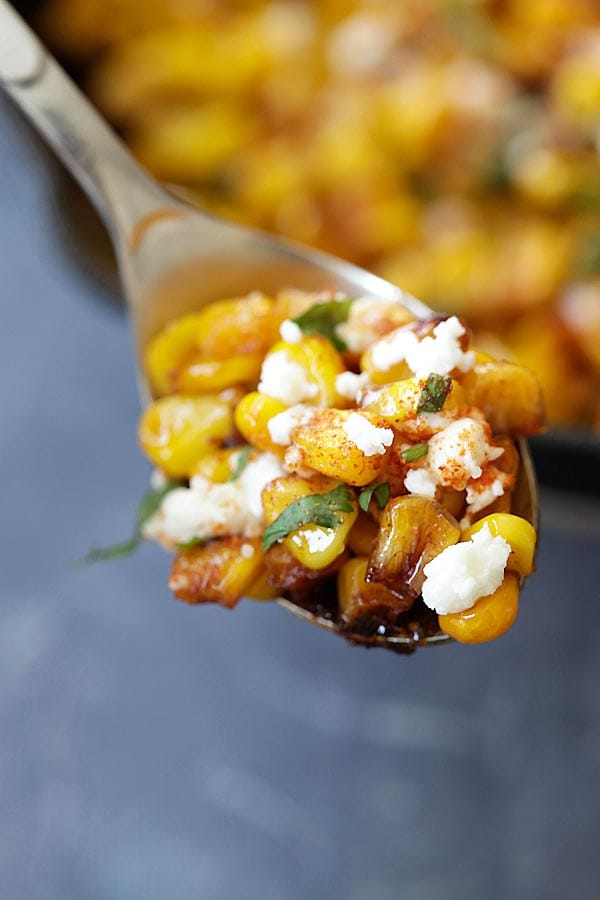 Mexican style skillet Chili Lime Corn on a spoon.