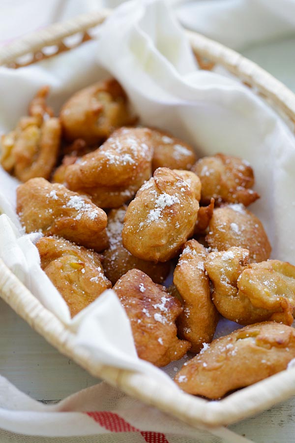 Easy and delicious sweet corn fritters made with creamed corn served in a basket.