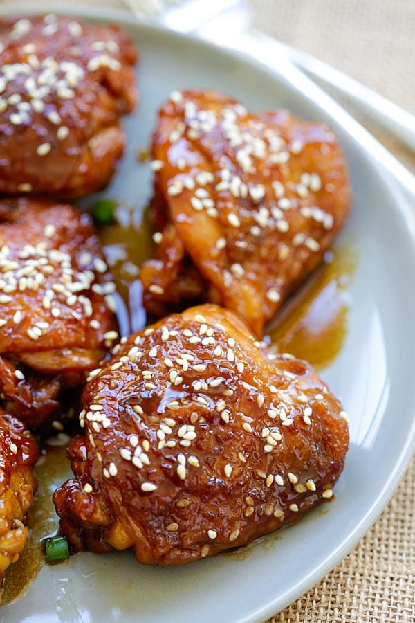 Healthy homemade slow cooker sesame chicken coated with delicious San-J Tamari and sesame sauce.