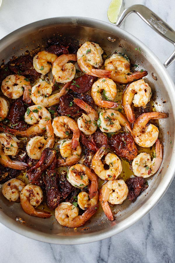 Garlic Sun-Dried Tomatoes Roasted Shrimp in a pot.