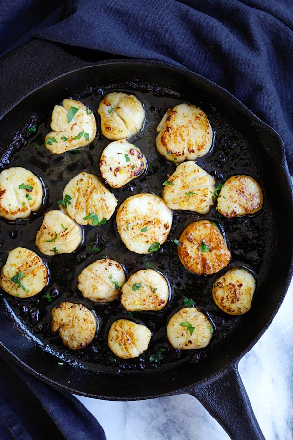 Top down view of Brown Butter Scallops in a skillet.