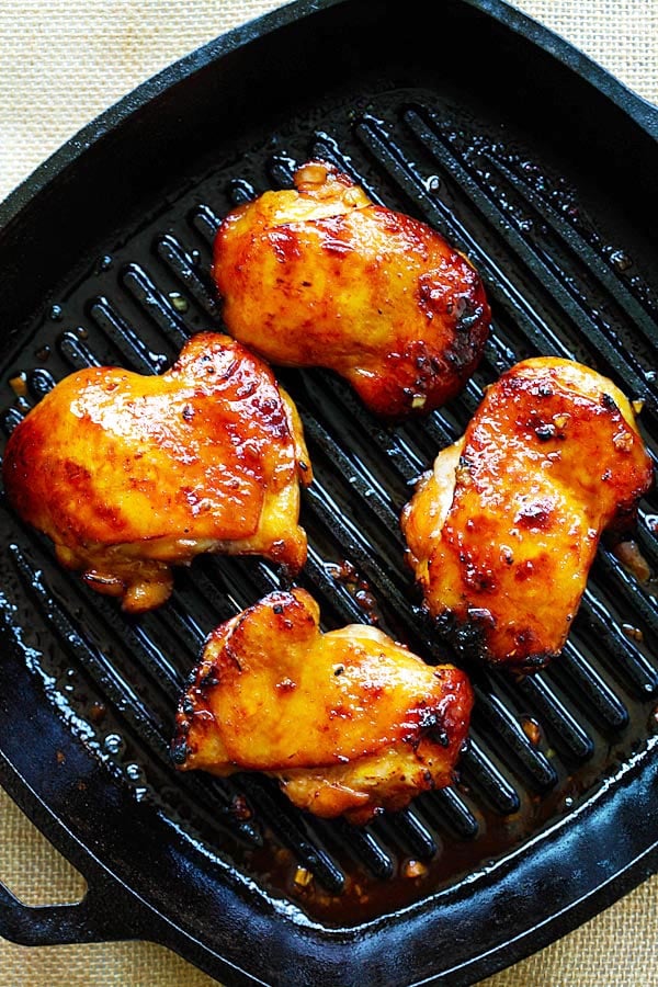 Asian style Honey Turmeric Chicken marinated with turmeric and cooked on skillet.