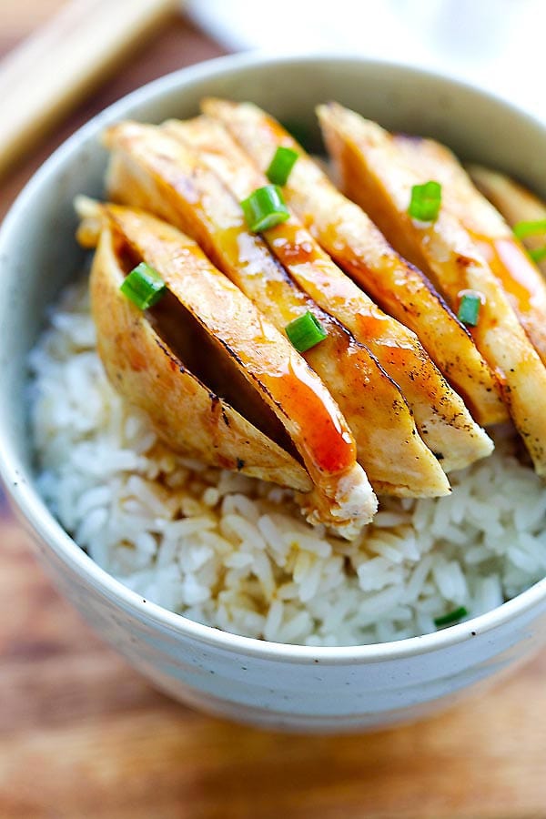 Healthy homemade skillet chicken, with orange mandarin glaze on top of steamed rice.