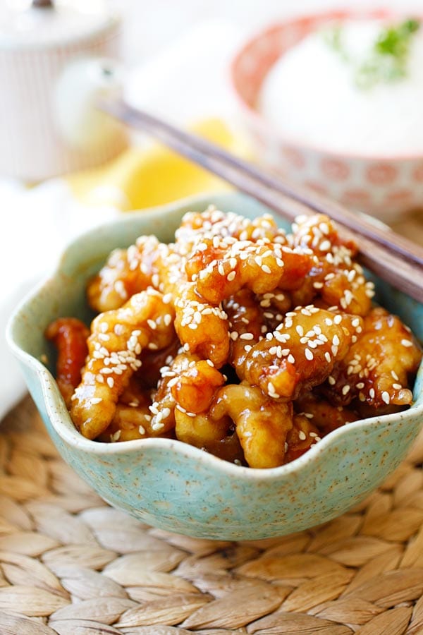 Sesame chicken with sesame sauce and sesame seeds.