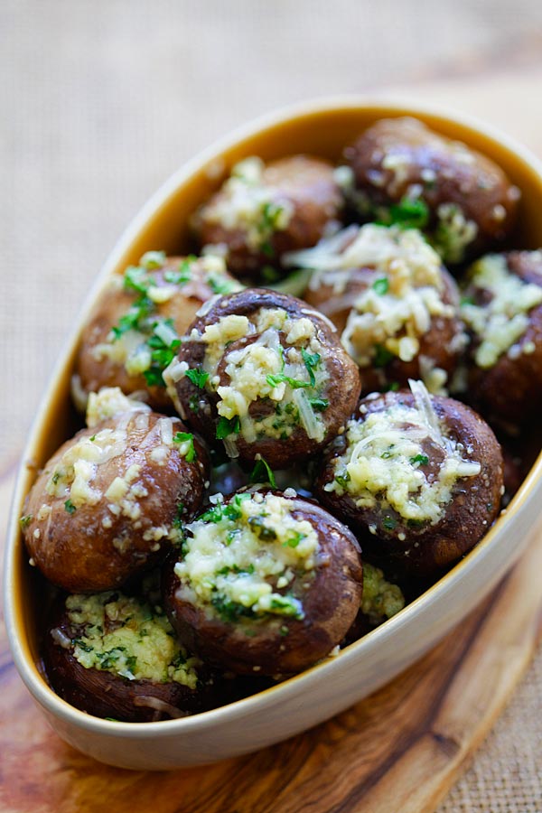 Easy and quick oven roasted mushrooms loaded with garlic and Parmesan cheese.