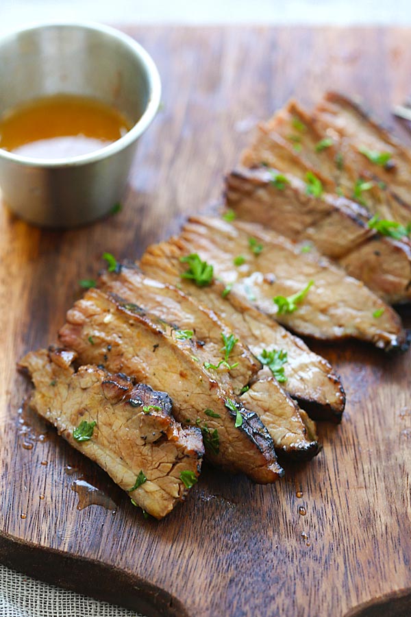 Easy and quick Honey Sriracha Flank Steak marinated with honey sriracha butter.