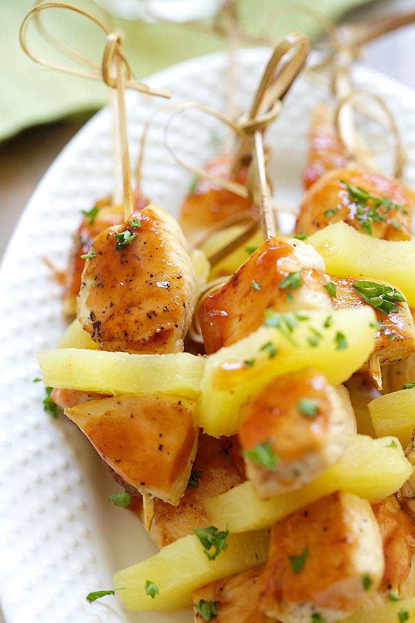 Hawaiian chicken kabob skewers with pineapple coated in homemade BBQ sauce.