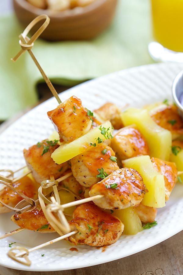 Hawaiian style grilled chicken on skewers with pineapple.