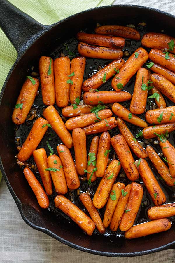 Top down easy and quick oven-roasted carrots with honey balsamic glaze.