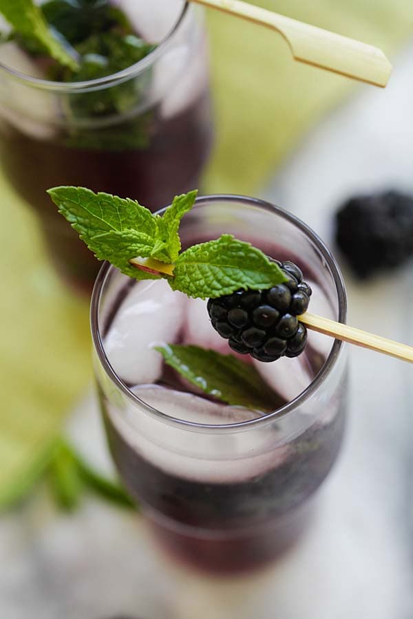 Homemade fruity booze blackberry mojito cocktail.