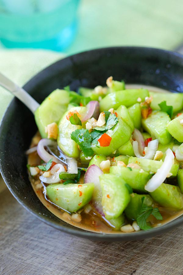Healthy homemade cucumber salad in a bowl, featuring Asian Thai flavors.