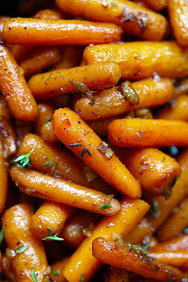 Close up of brown butter garlic honey roasted carrots, ready to serve.