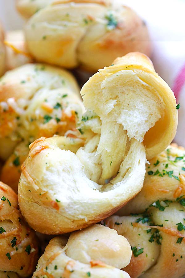 Easy baked dinner rolls with garlic and Parmesan cheese closed up.