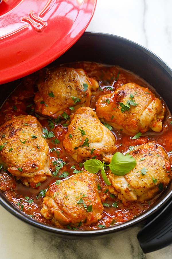 Delicious one-pot Italian braised chicken recipe with tomato and basil sauce.
