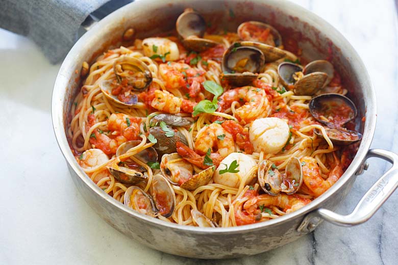 Seafood pasta in skillet.