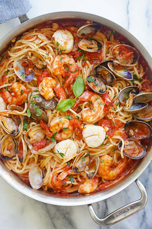 Top down view of seafood pasta with homemade tomato seafood pasta sauce sauce and seafood.