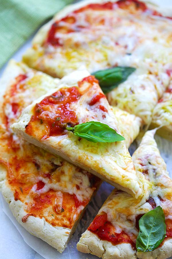 Slices of gluten-free pizza Margherita ready to serve.