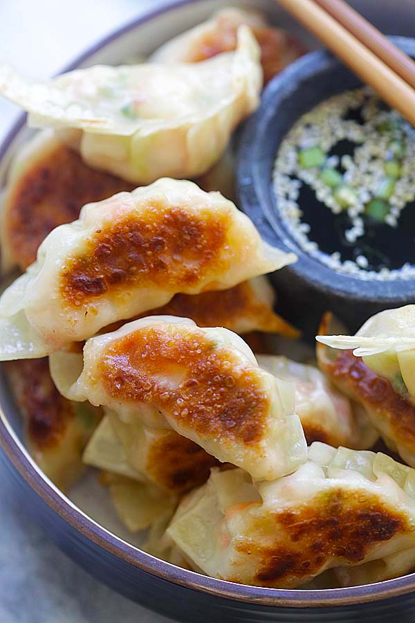 Shrimp Gyoza - amazing Japanese gyoza dumplings filled with shrimp and cabbage. Crispy, juicy and so easy to make at home | rasamalaysia.com