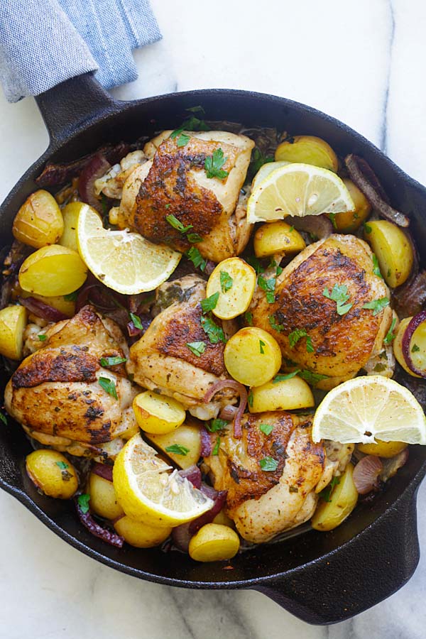 Easy and quick one-pot Spanish chicken and potatoes bake with onions, garlic, and paprika.