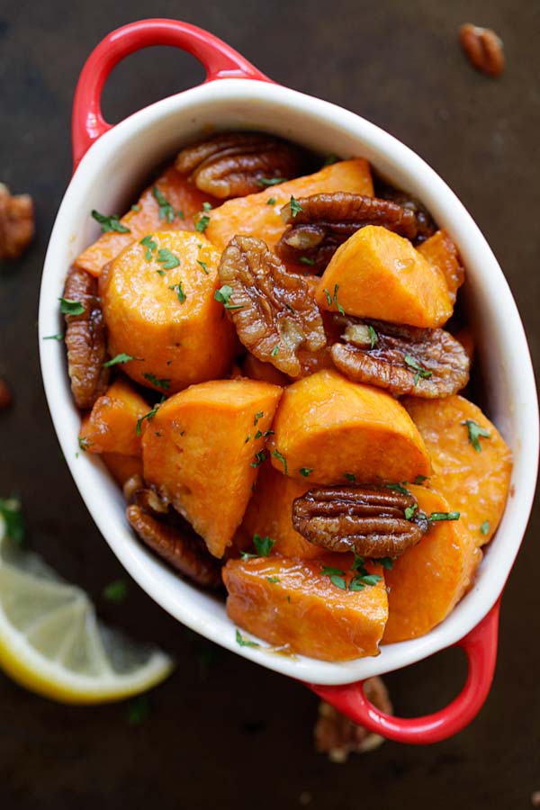 Top down view of healthy and delicious maple glazed roasted sweet potatoes with pecan.