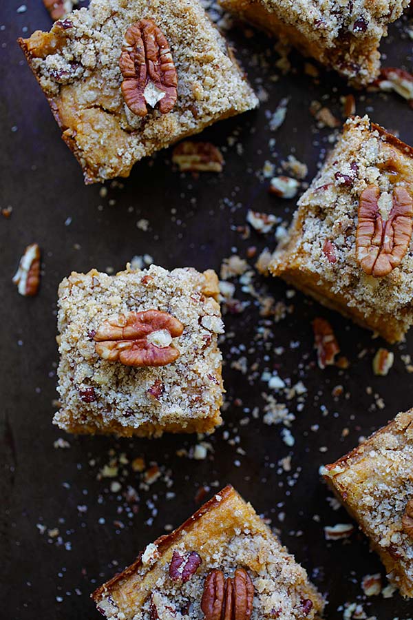 Easy and delicious homemade cheesecake bar made with pumpkin and pecan in cube sizes.