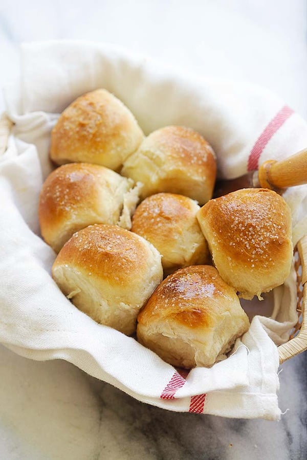 Easy skillet bread rolls pulled apart and served in a basket.