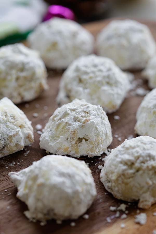 Closed up chocolate snowballs made with pecan.