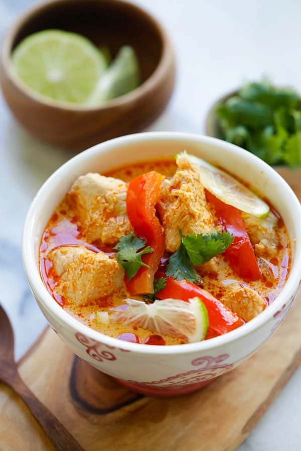 Easy and quick creamy Thai coconut chicken soup in a bowl.