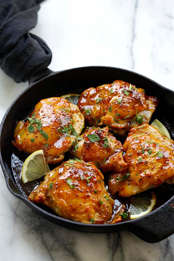 Easy and quick skillet chicken in a spicy and sweet honey glaze ready to serve.