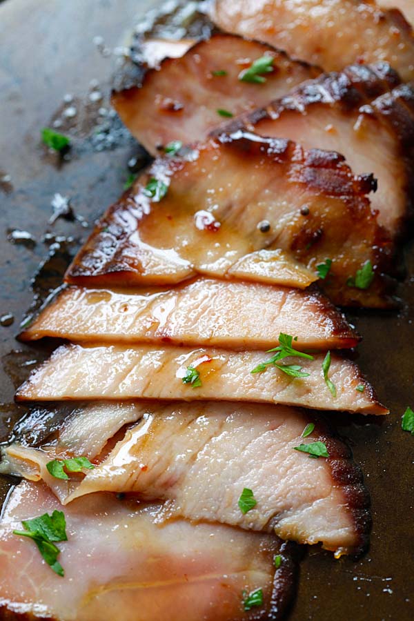 Glazed ham with honey, sliced and ready to be served.