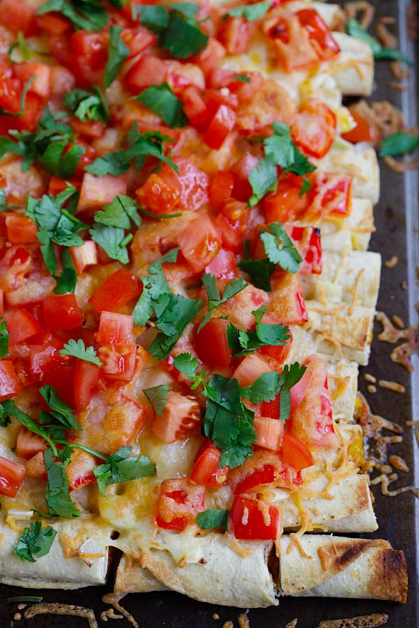 Delicious and healthy homemade baked small rolled-up tortilla loaded with cheese.