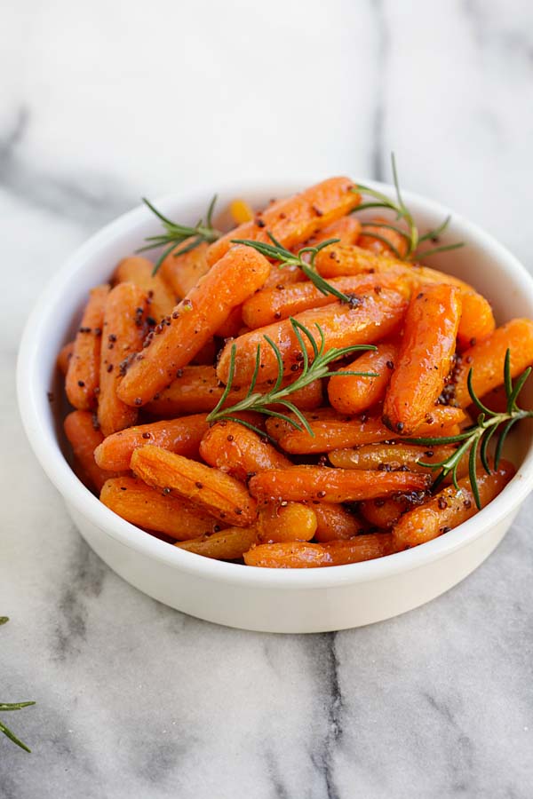 Maple dijon glazed carrots roasted in maple syrup and dijon mustard.