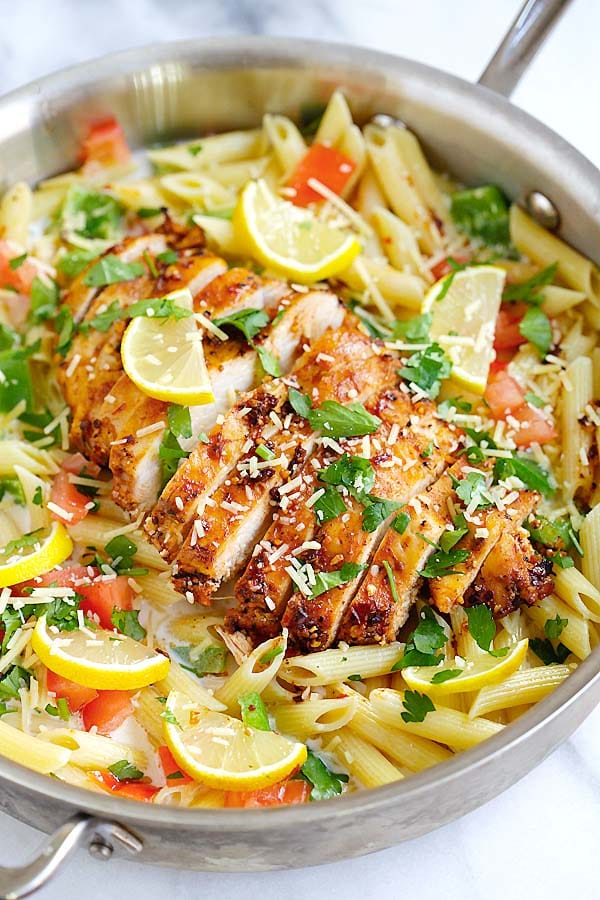 Easy homemade creamy pasta with spicy blackened spice chicken breast in a pot.