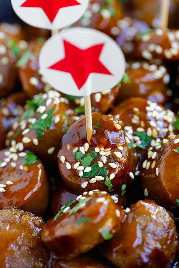 Close up easy sausage bites in a sweet and sticky honey barbecue sauce.
