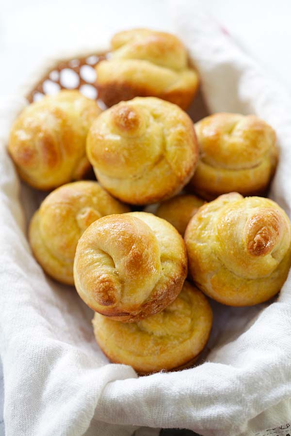 Brioche rolls in a basket.