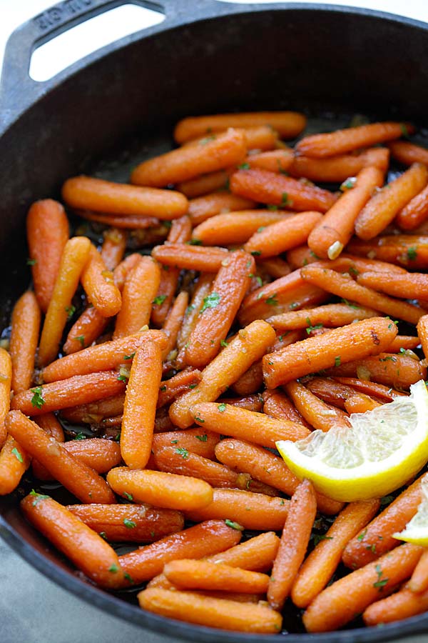 Easy and quick oven-roasted carrots marinade with brown sugar.