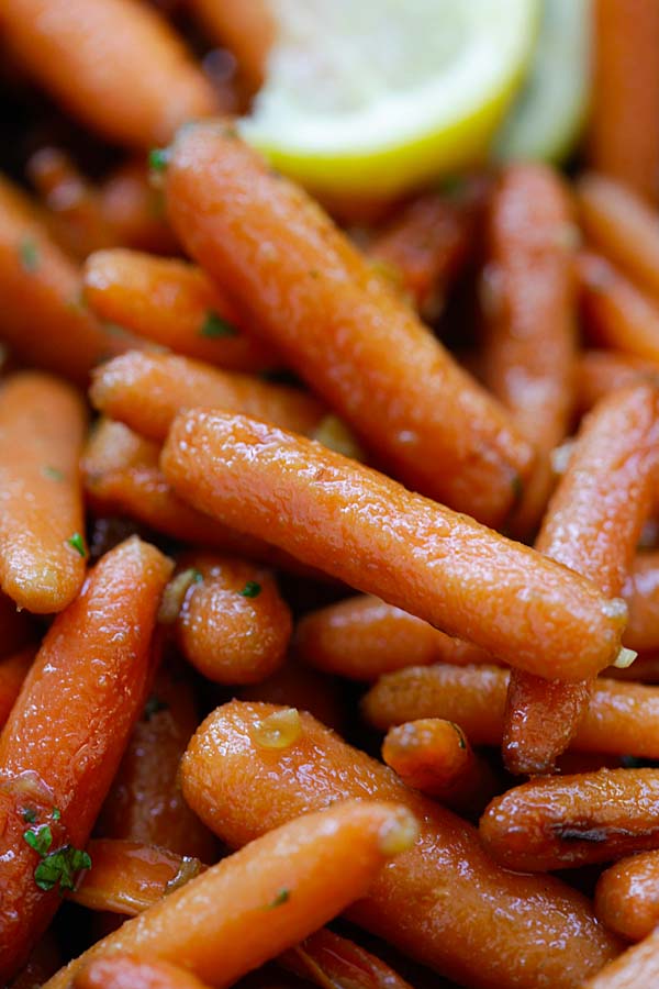 Closed up brown sugar roasted baby carrots, ready to serve.